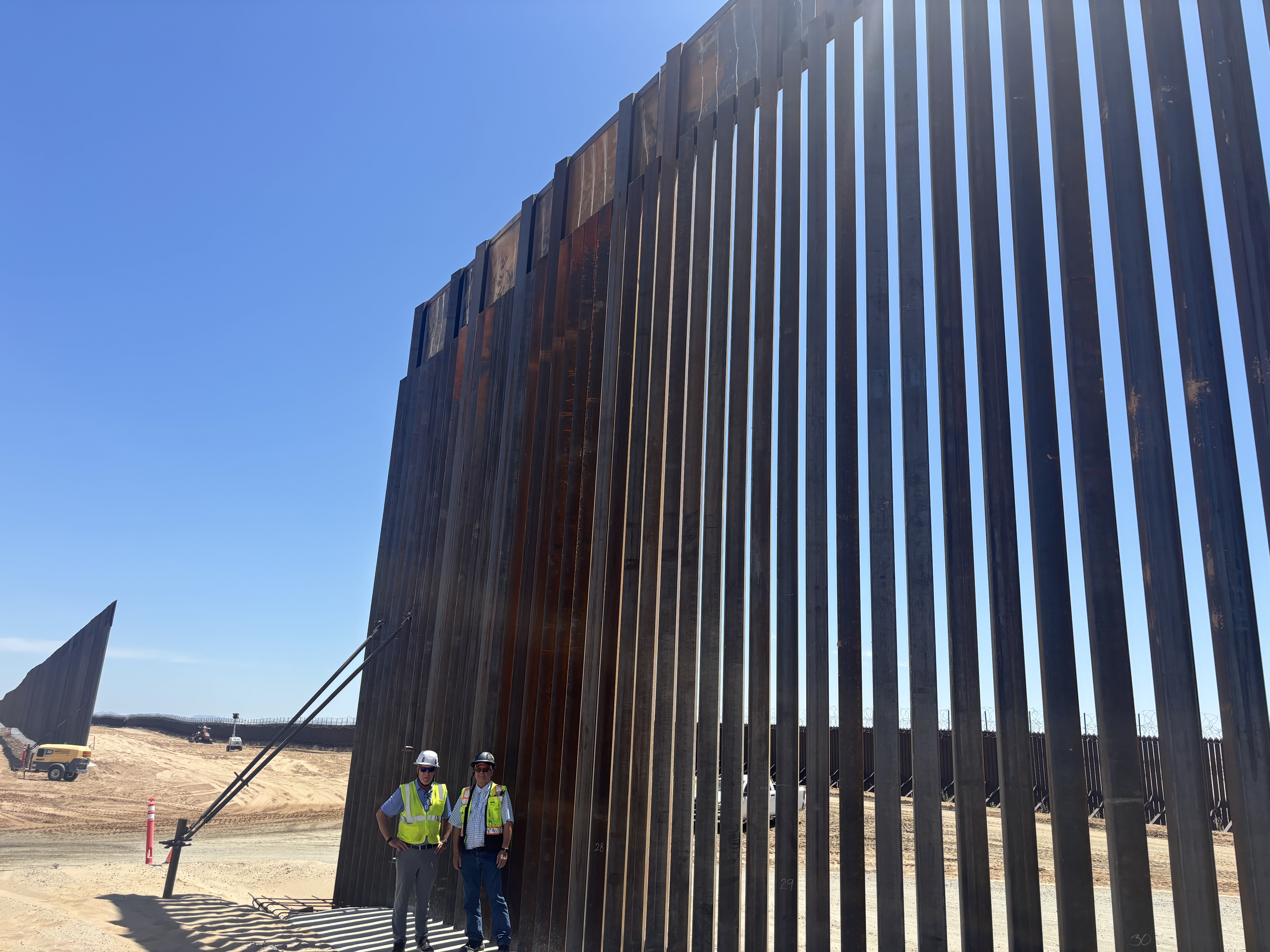 Field visit team inspecting the height and construction of the California border fence
