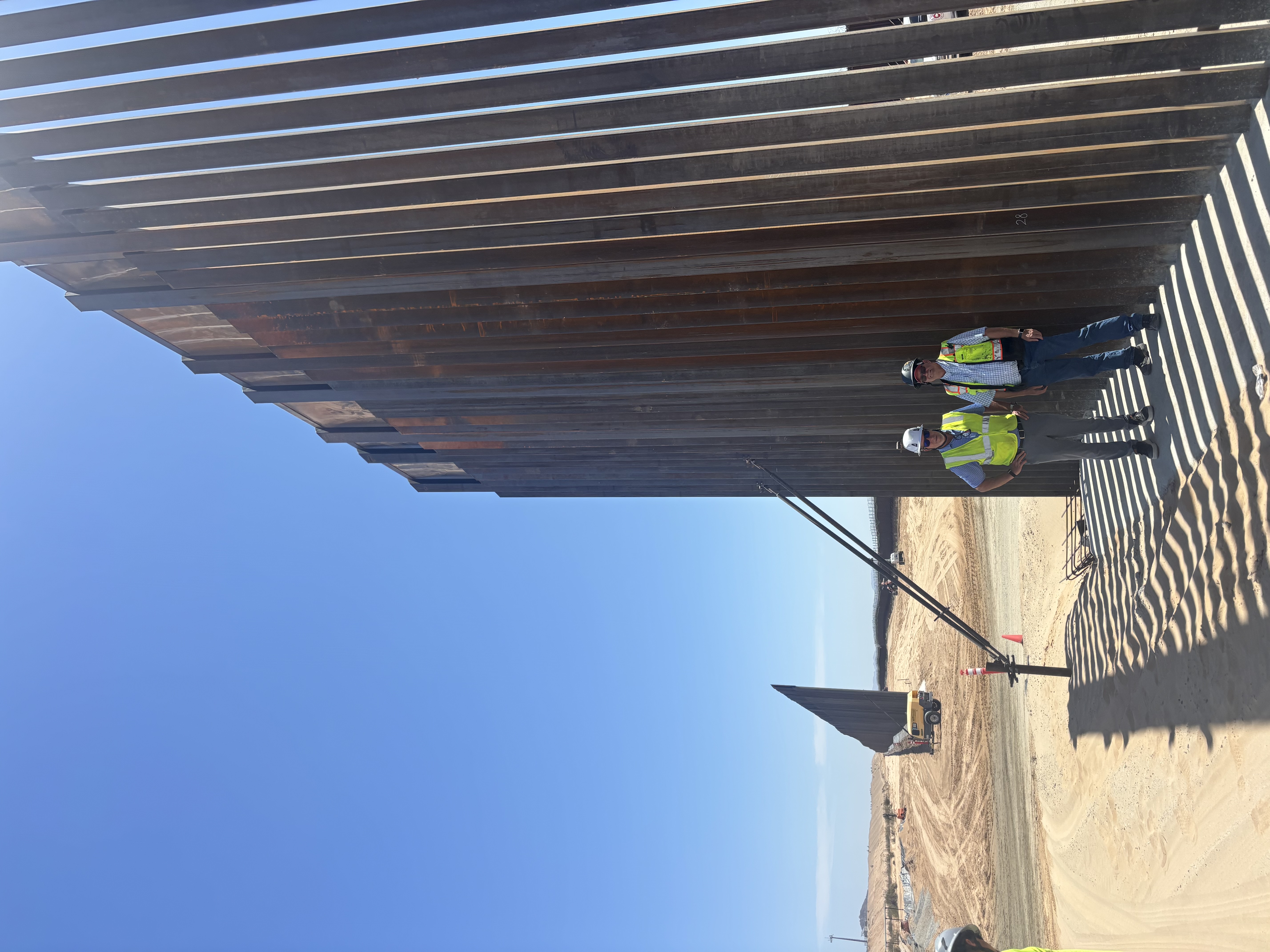 Field-visit representatives at the California border fence worksite in the desert